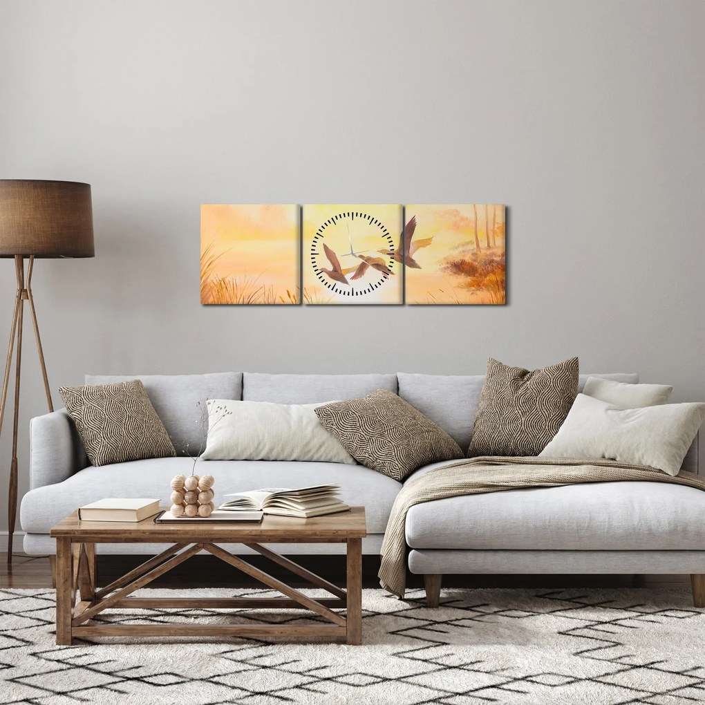 Obraz - Żurawie o zachodzie słońca (z zegarem) (90x30 cm)