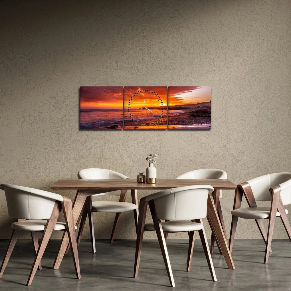 Obraz zachodu słońca nad morzem (z zegarem) (90x30 cm)