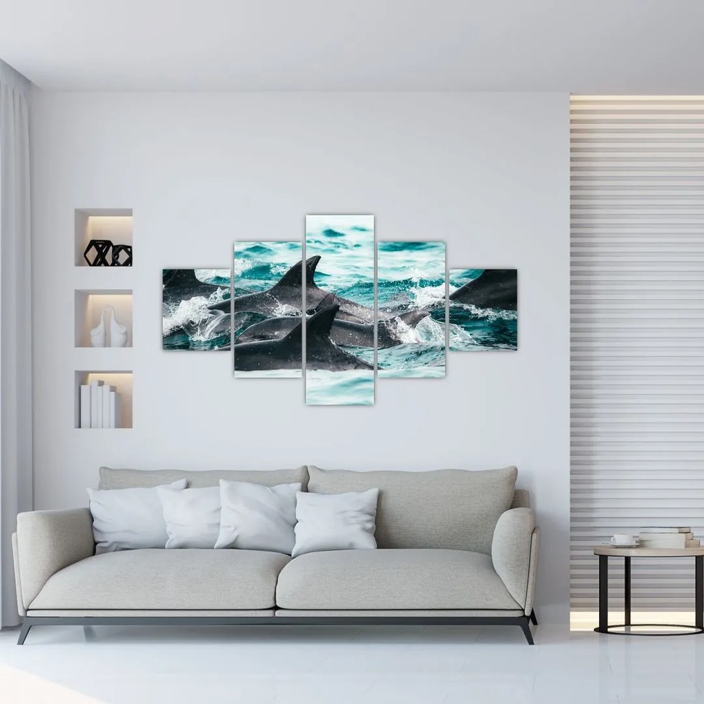 Obraz - Delfiny w oceanie (125x70 cm)