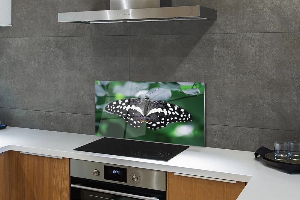 Panel Szklany Motyl na Zielonych Liściach