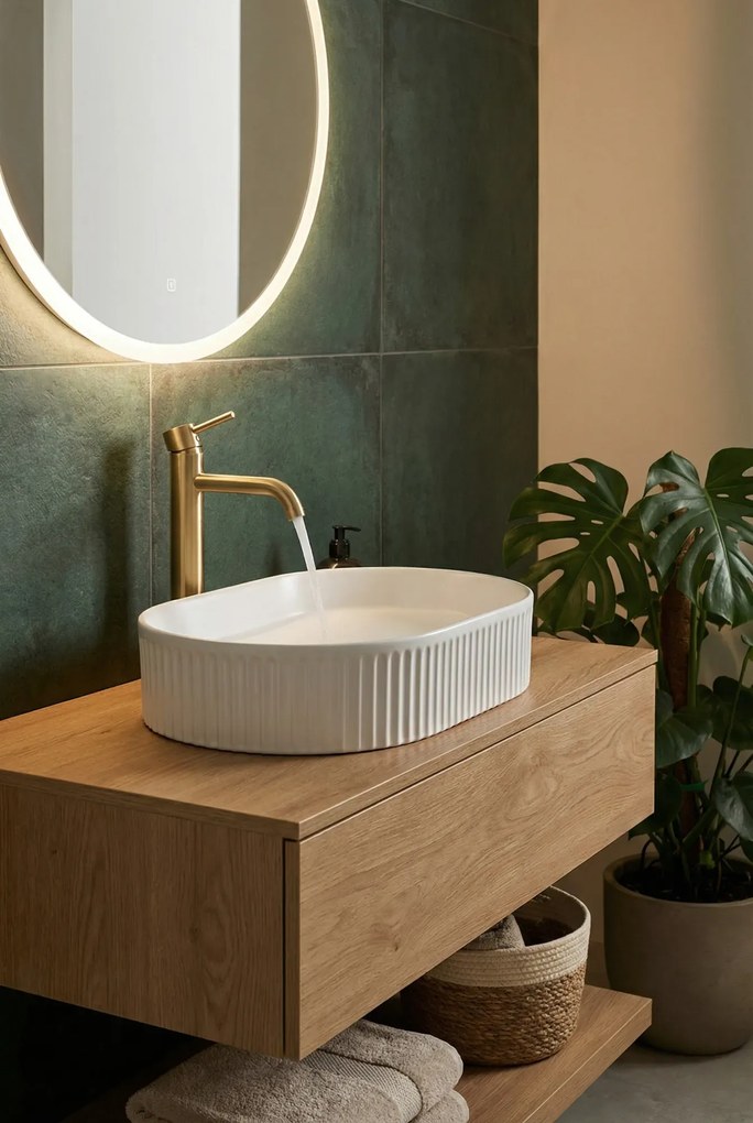 Biała owalna ceramiczna umywalka F8-C77