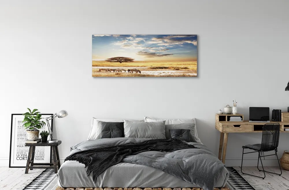 Zdjęcie na płótnie Zebry i Drzewo na Tle Chmur