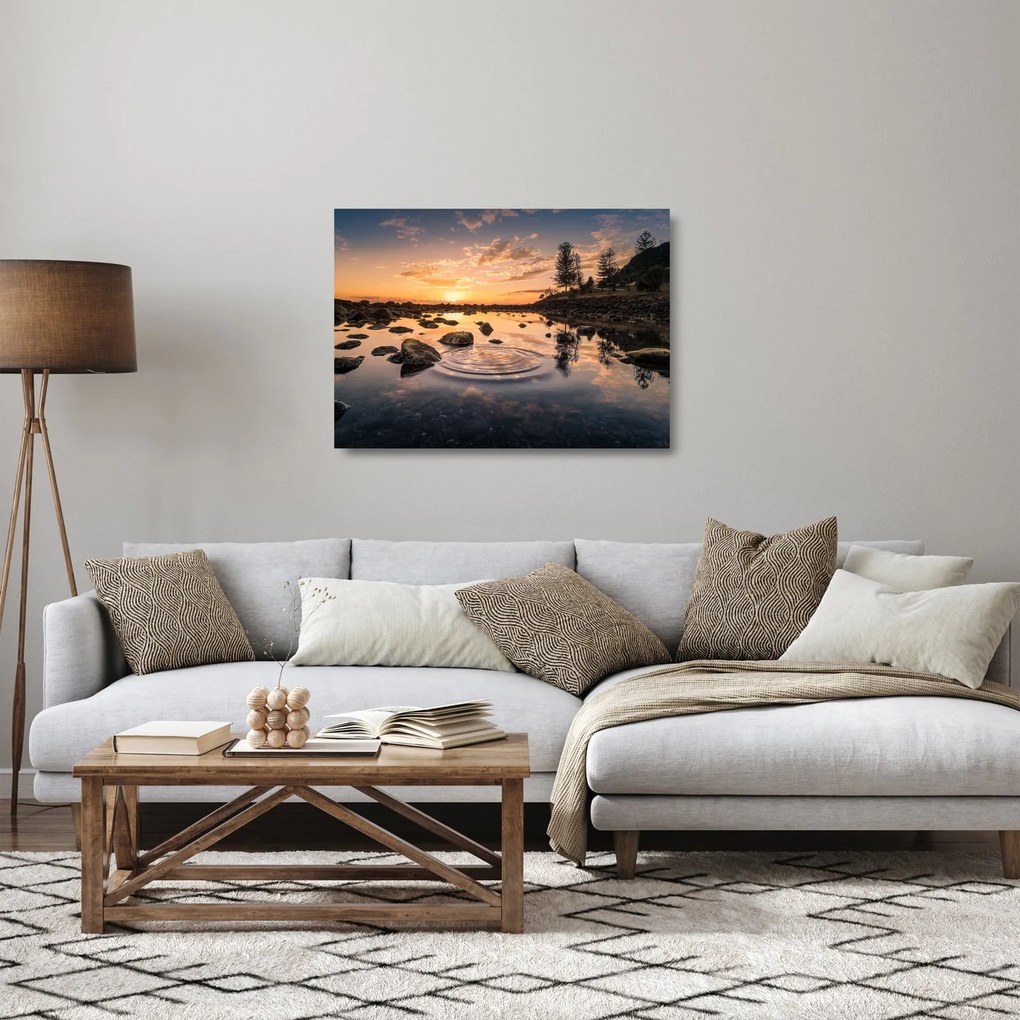 Obraz na szkle powierzchni wody o zachodzie słońca (70x50 cm)
