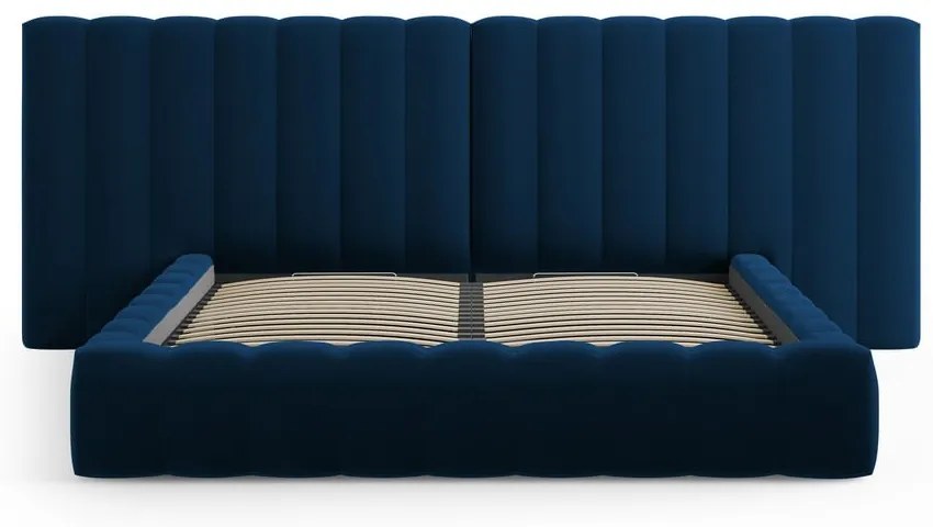Ciemnoniebieskie tapicerowane łóżko dwuosobowe ze schowkiem i stelażem 180x200 cm Gina – Milo Casa