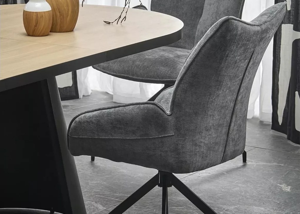 Nowoczesny rozkładany stół owalny Heksagon 180-230/100 cm z blatem MDF w kolorze dębu na czarnych metalowych nogach