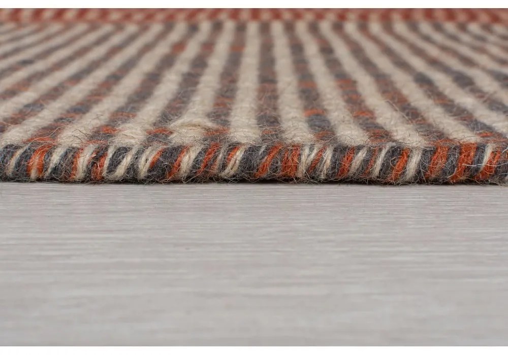 Pomarańczowy wełniany chodnik Flair Rugs Anu, 60x200 cm