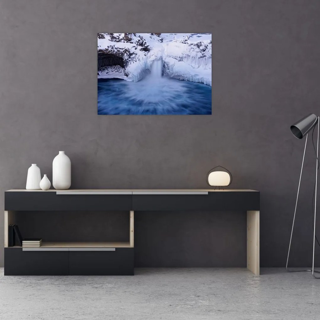 Obraz na szkle wodospadu zimą (70x50 cm)