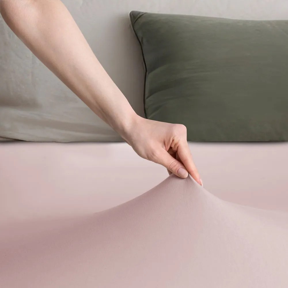 Jasnoróżowe dżersejowe prześcieradło z gumką 180x200 cm Amber – Restilo