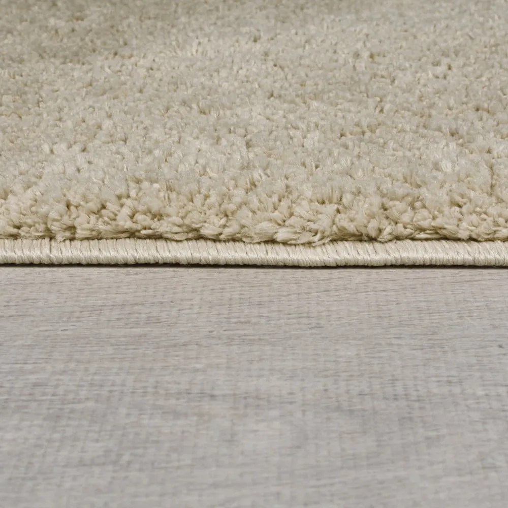 Beżowy okrągły dywan z włókien z recyklingu odpowiedni do prania 133x133 cm Fluffy – Flair Rugs