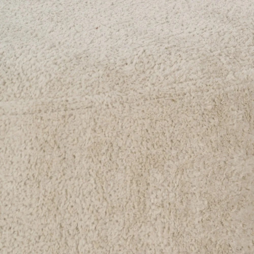 Beżowy puf z materiału bouclé – Ixia