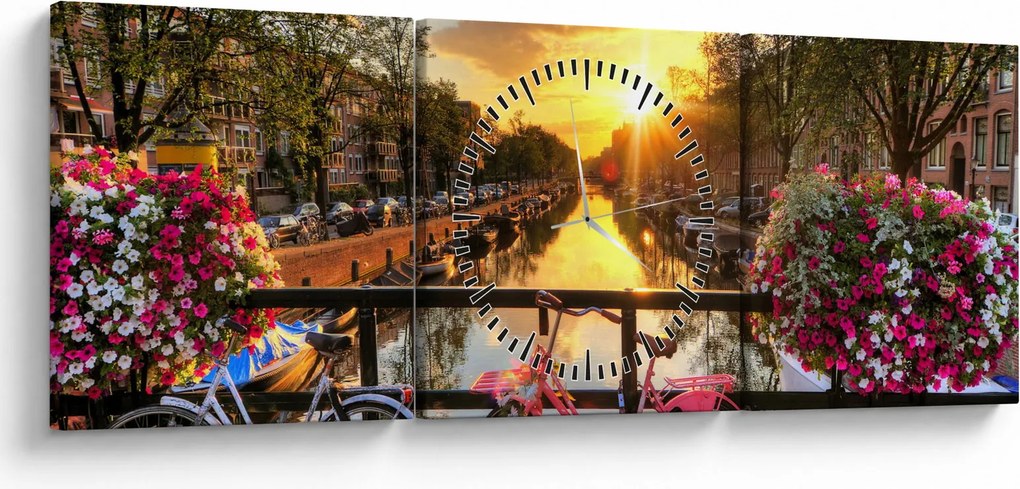 Obraz - Wschód słońca w Amsterdamie (z zegarem) (90x30 cm)
