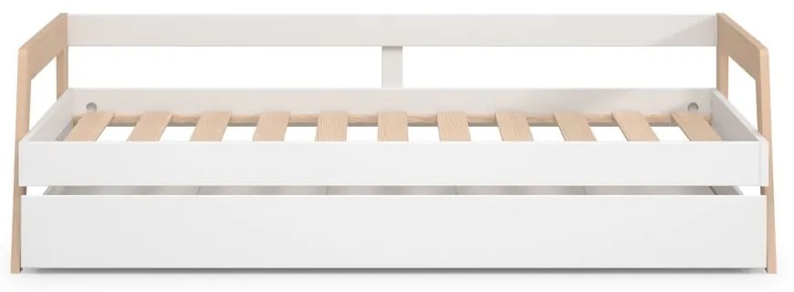 Białe łóżko dziecięce z litego drewna sosnowego z wysuwanym łóżkiem ze schowkiem i stelażem 90x200 cm Carrie – Marckeric