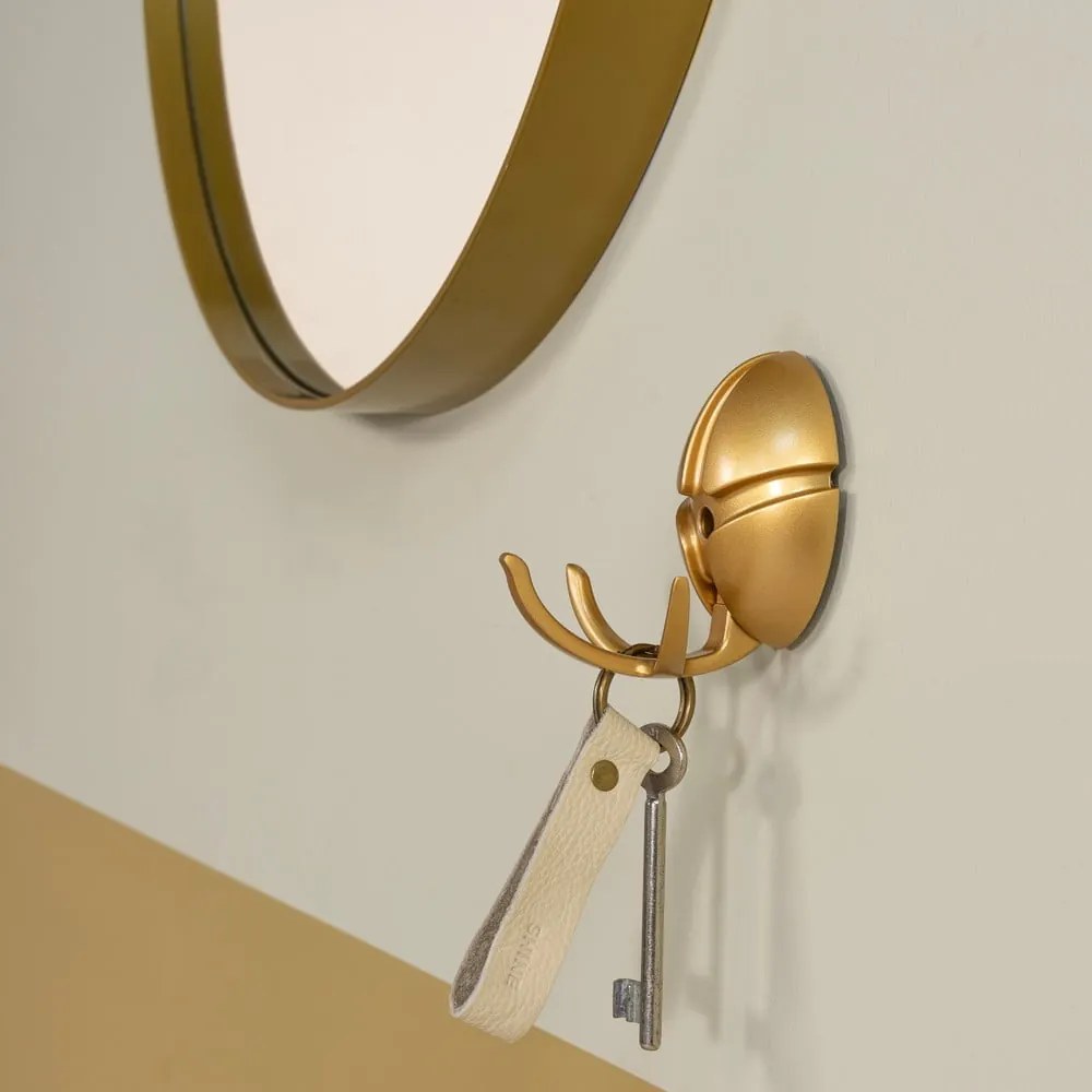 Ścienny plastikowy haczyk w kolorze złota Tick – Spinder Design