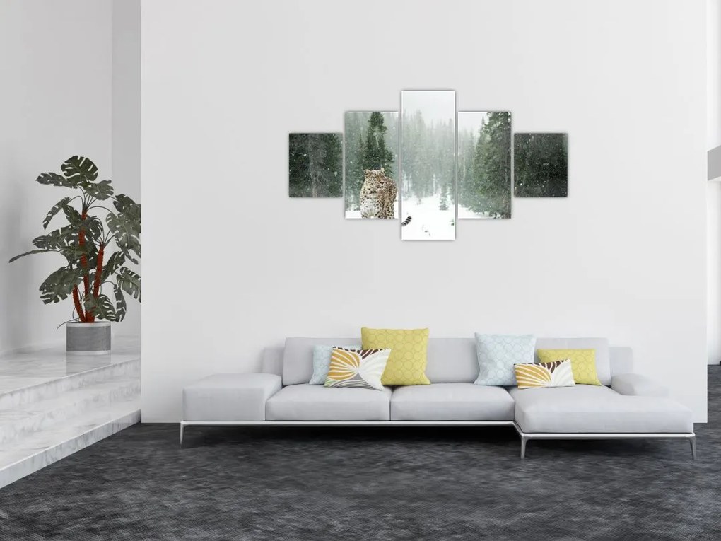 Obraz lamparta na śniegu (125x70 cm)