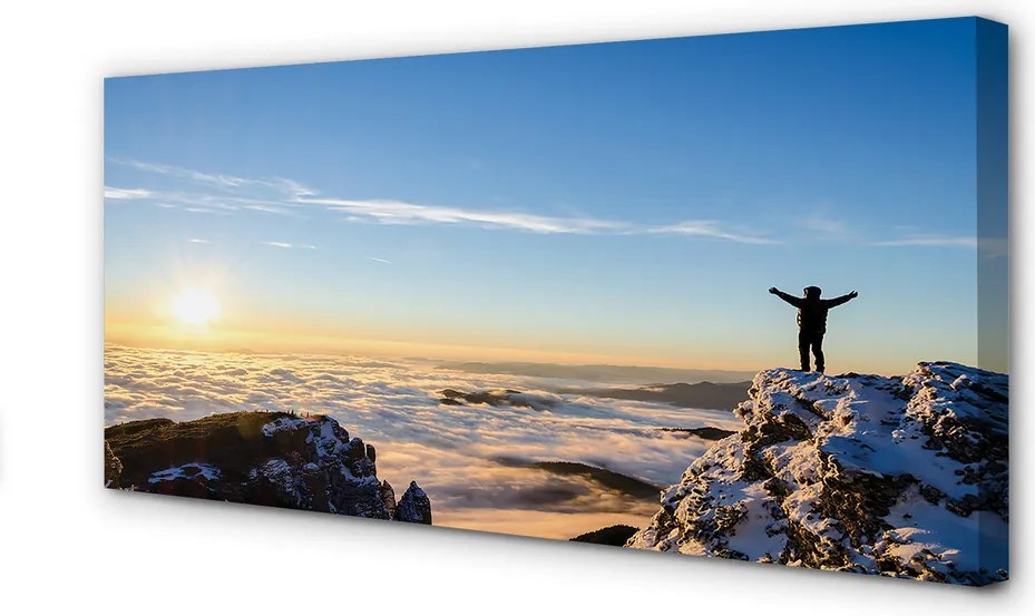 Obraz canvas na ścianę Człowiek w Górach o Wschodzie