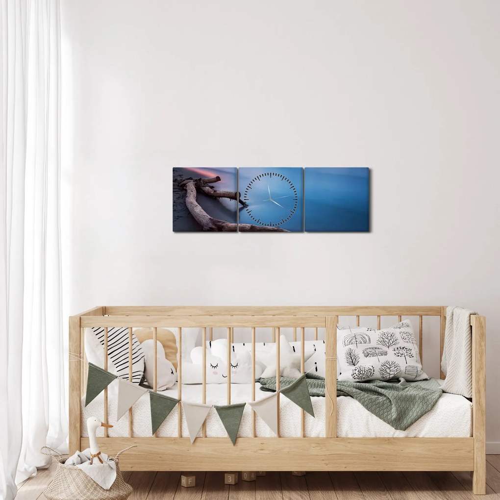 Obraz plaży o zachodzie słońca (z zegarem) (90x30 cm)