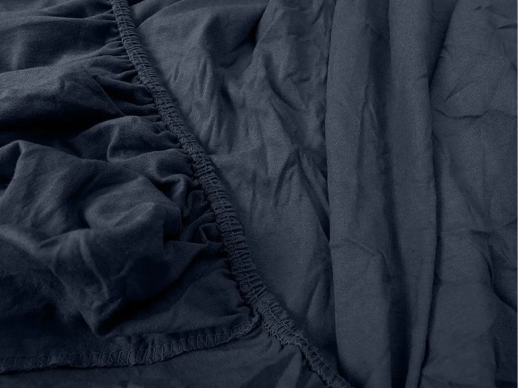 PrzytulneMieszkanie.pl Prześcieradło jersey HIGHFIT w kolorze granatowym 90 x 200 cm