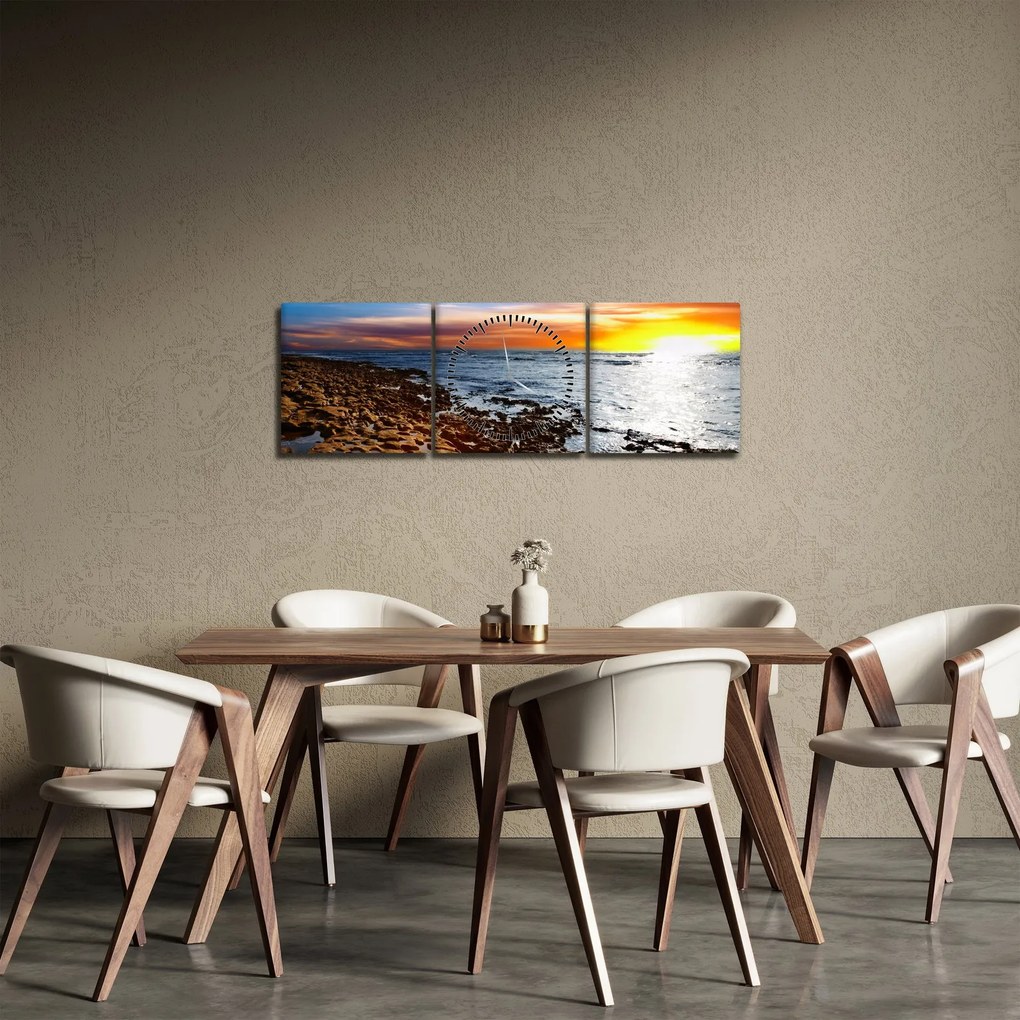 Obraz - Mewa lecąca nad wybrzeżem (z zegarem) (90x30 cm)