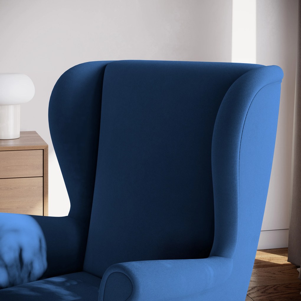 Luksusowy fotel LENTIO stylowy uszak w niebieskiej tkaninie, plusz velvet