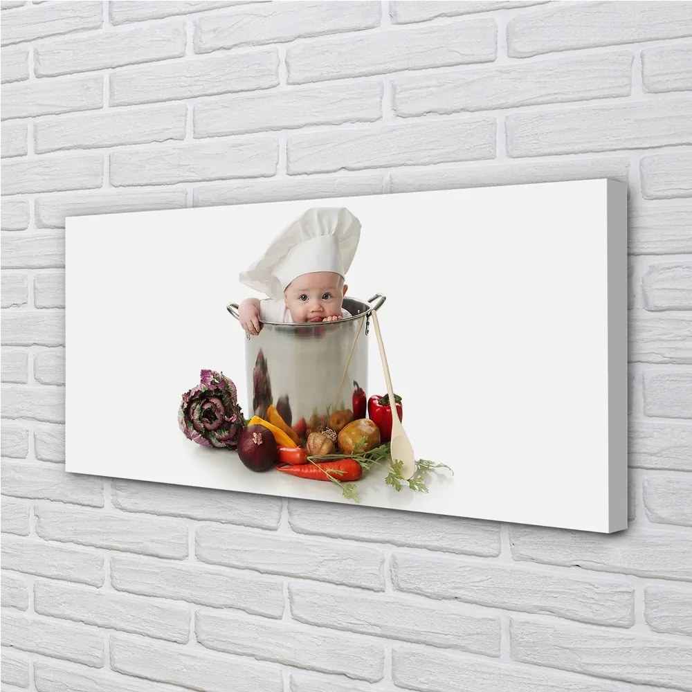 Obraz drukowany na płótnie Dziecko bawiące się w Kuchni