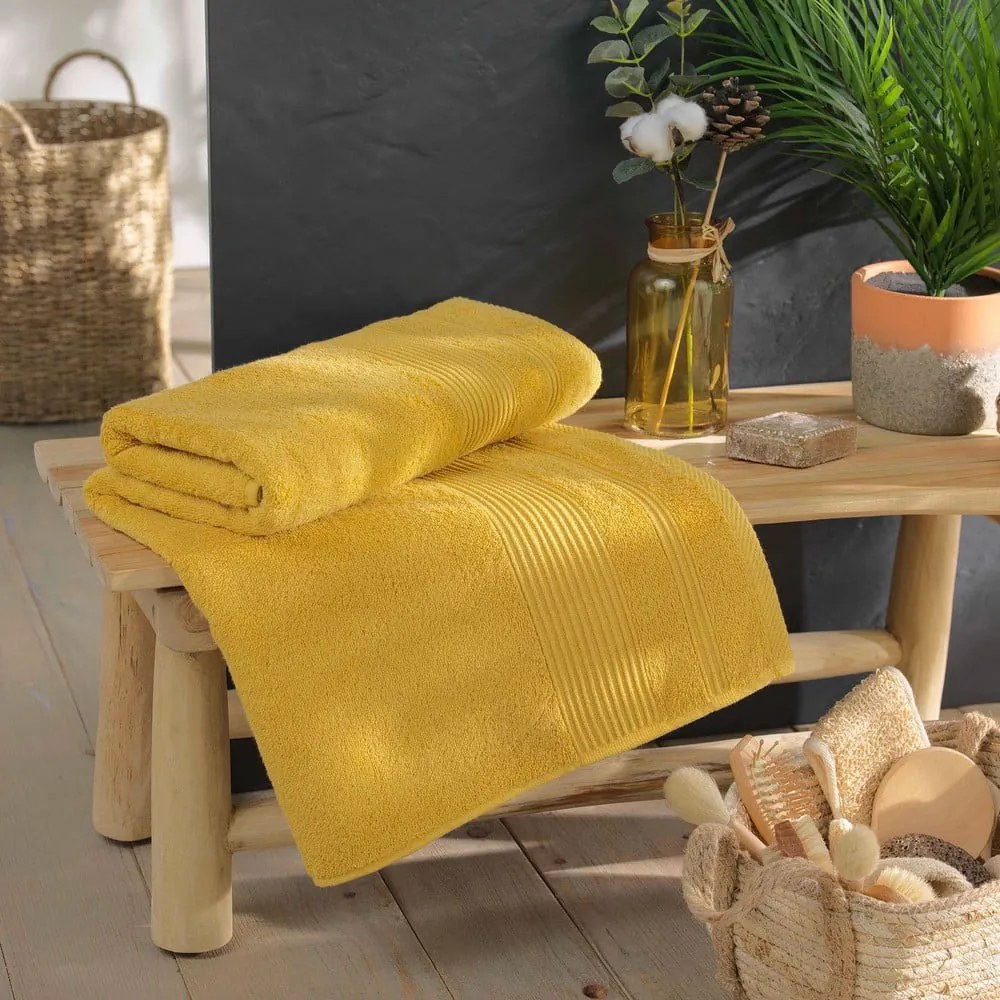 Żółty bawełniany ręcznik kąpielowy frotte 90x150 cm Tendresse – douceur d'intérieur