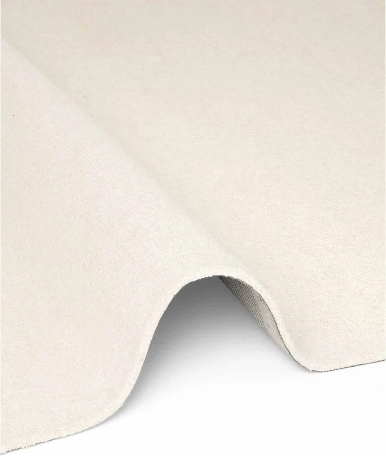 Kremowy wełniany dywan tkany ręcznie 140x200 cm Puristic Knots – Elle Decoration