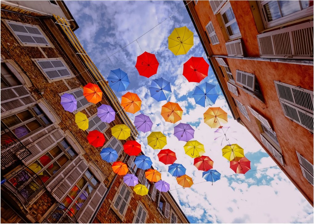 Obraz na szkle kolorowych parasoli (70x50 cm)
