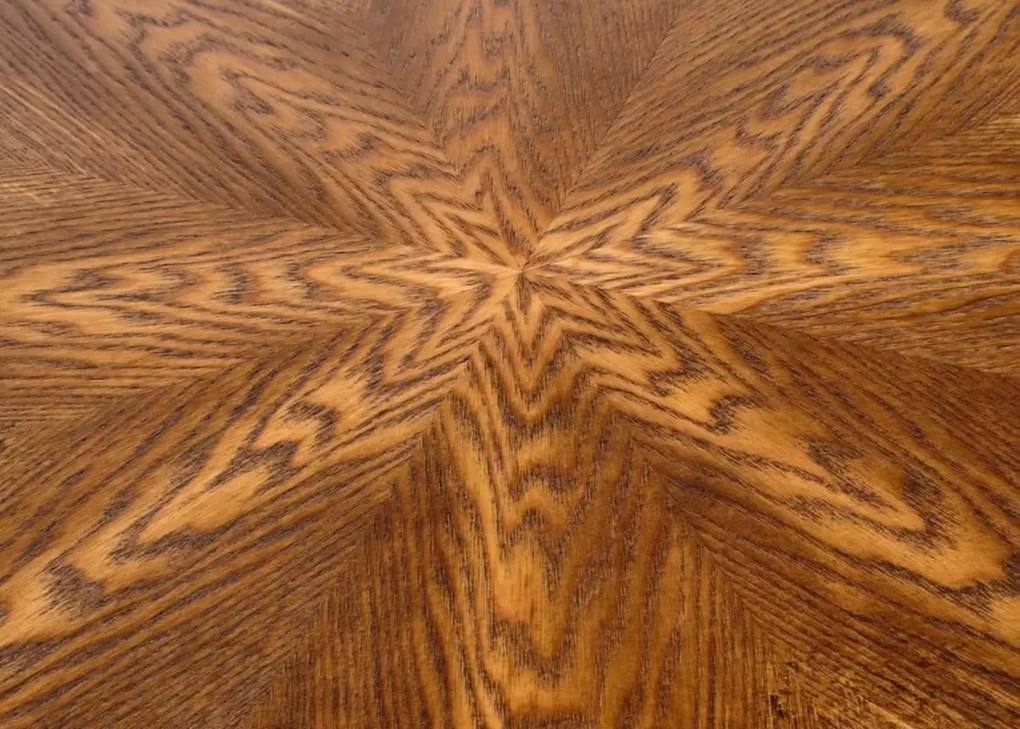 Nowoczesny okrągły stół z czarną nogą Carma 100 cm z blatem MDF w kolorze naturalnego drewna