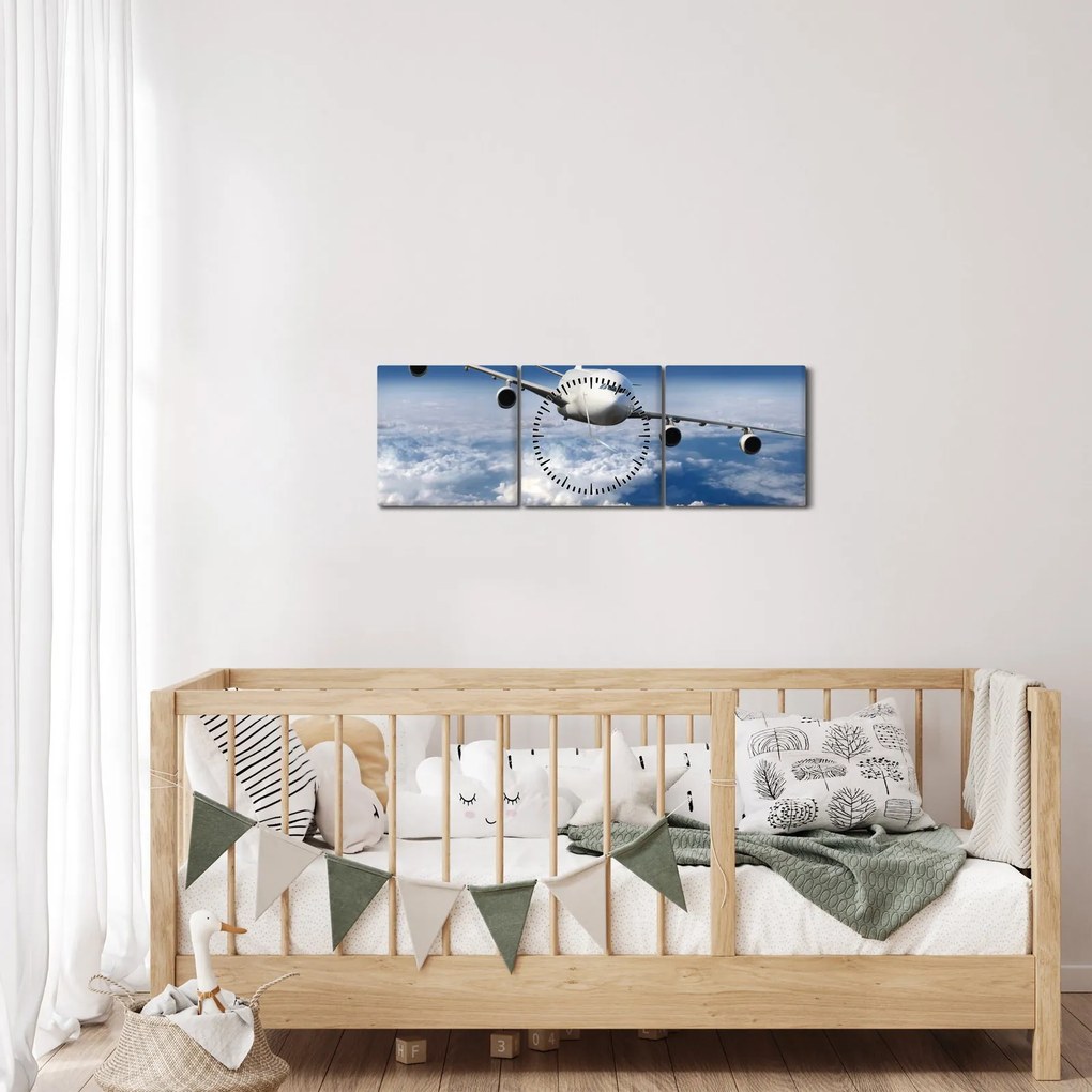 Obraz - Samolot w chmurach (z zegarem) (90x30 cm)