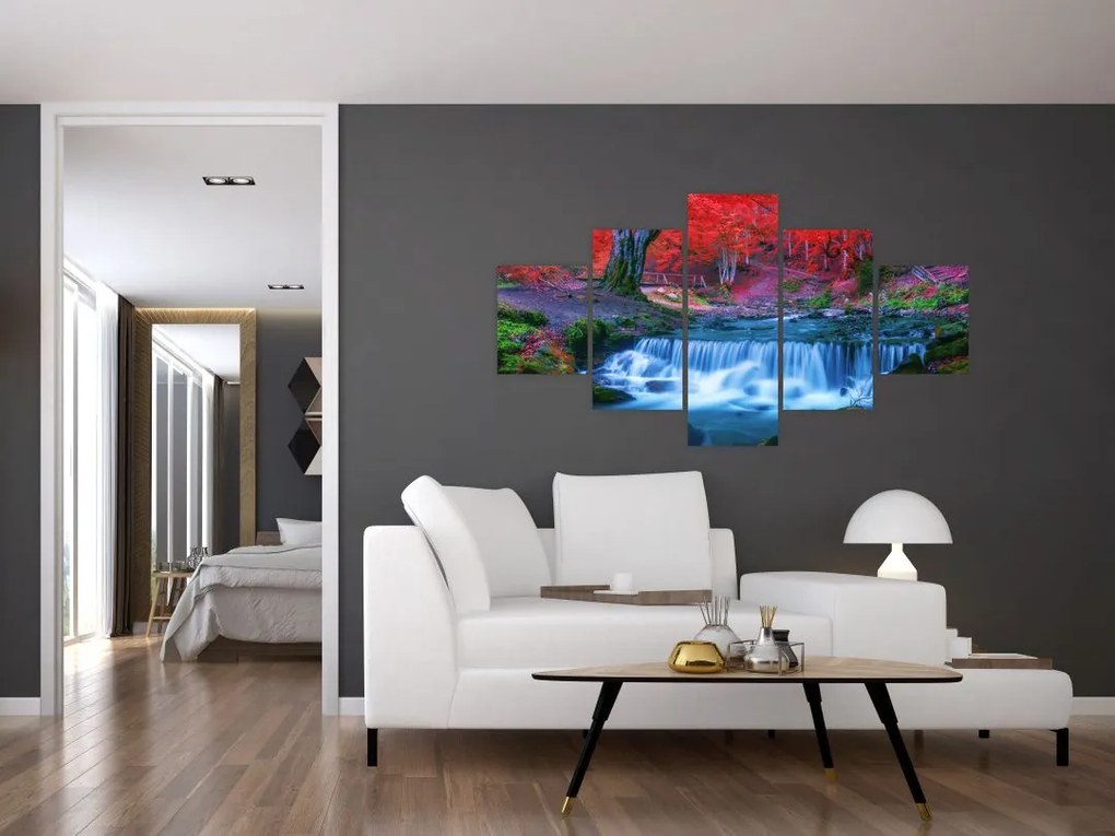 Obraz wodospadu w czerwonym lesie (125x70 cm)