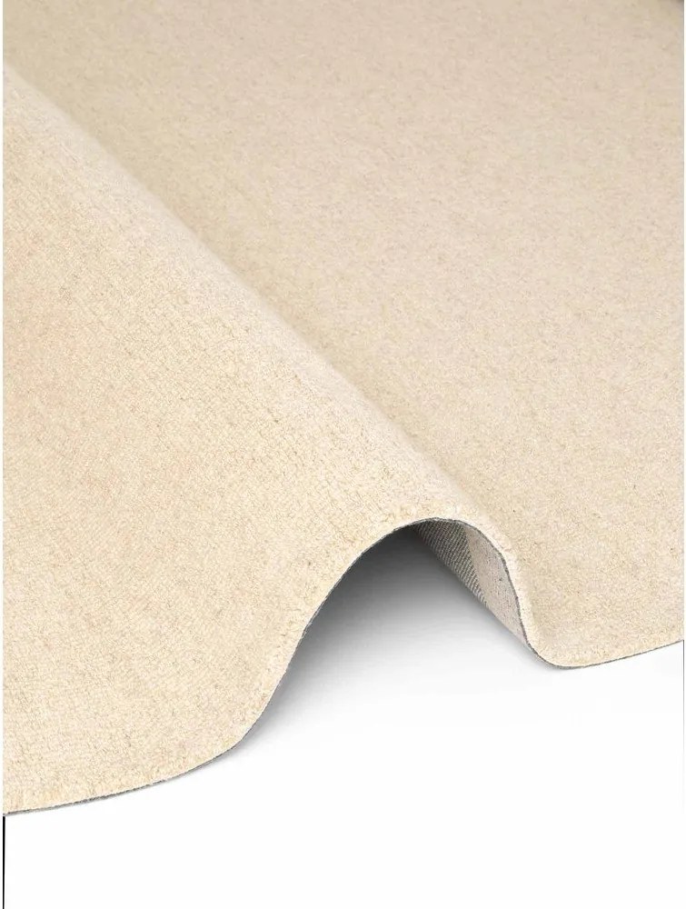 Beżowy wełniany okrągły dywan tkany ręcznie ø 200 cm Puristic Knots – Elle Decoration