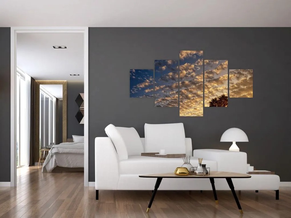Obraz - palmy pośród chmur (125x70 cm)