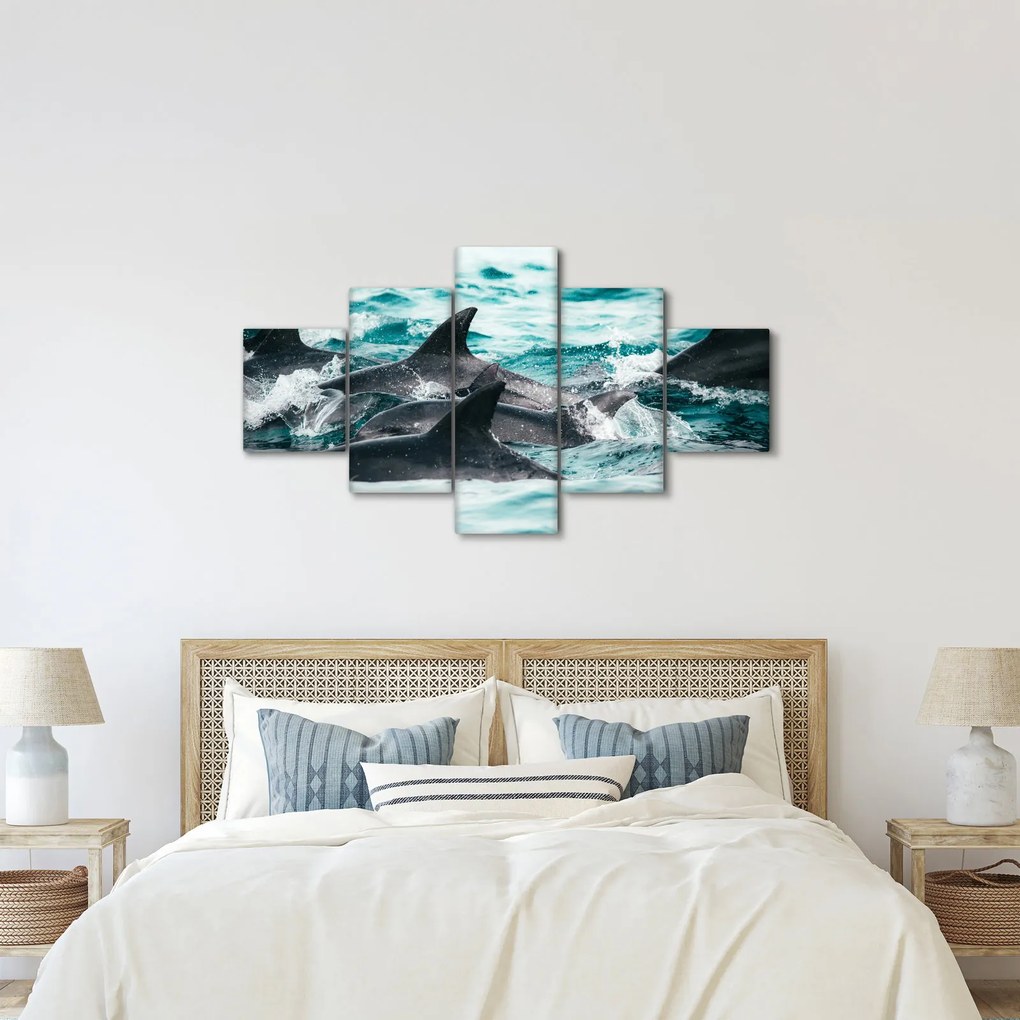 Obraz - Delfiny w oceanie (125x70 cm)