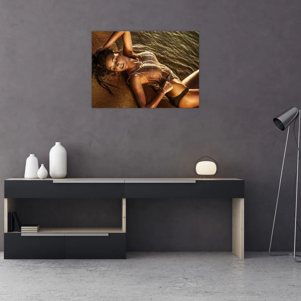 Obraz kobiety leżącej na plaży (70x50 cm)