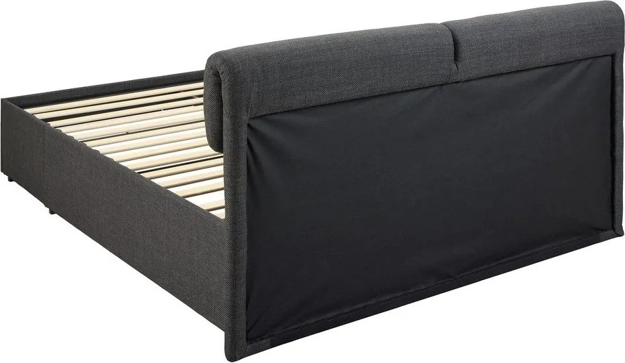 Ciemnoszare tapicerowane łóżko dwuosobowe ze schowkiem i stelażem 160x200 cm Calvi – Actona