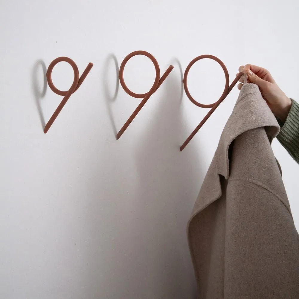 Ścienny stalowy haczyk w kolorze terakoty Tuba M – Spinder Design