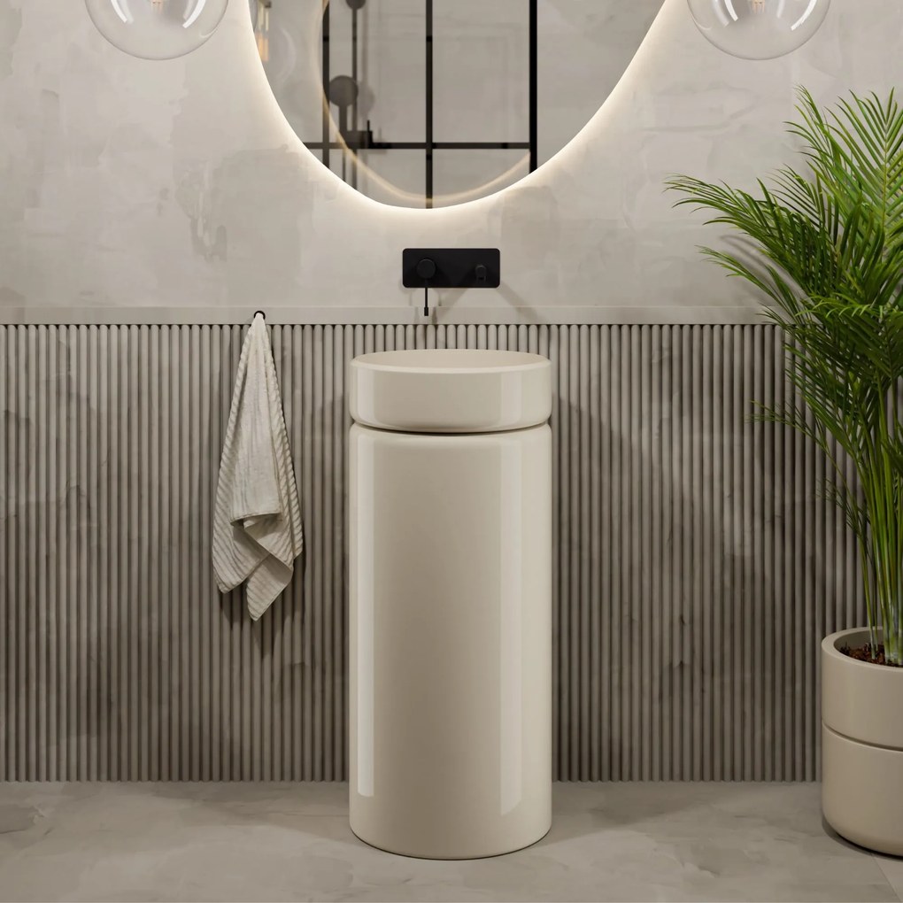 Umywalka z konglomeratu wolnostojąca okrągła beżowa błyszcząca 85 x 40 cm RONA Beige Glow : Podłączenie syfonu - Do ściany