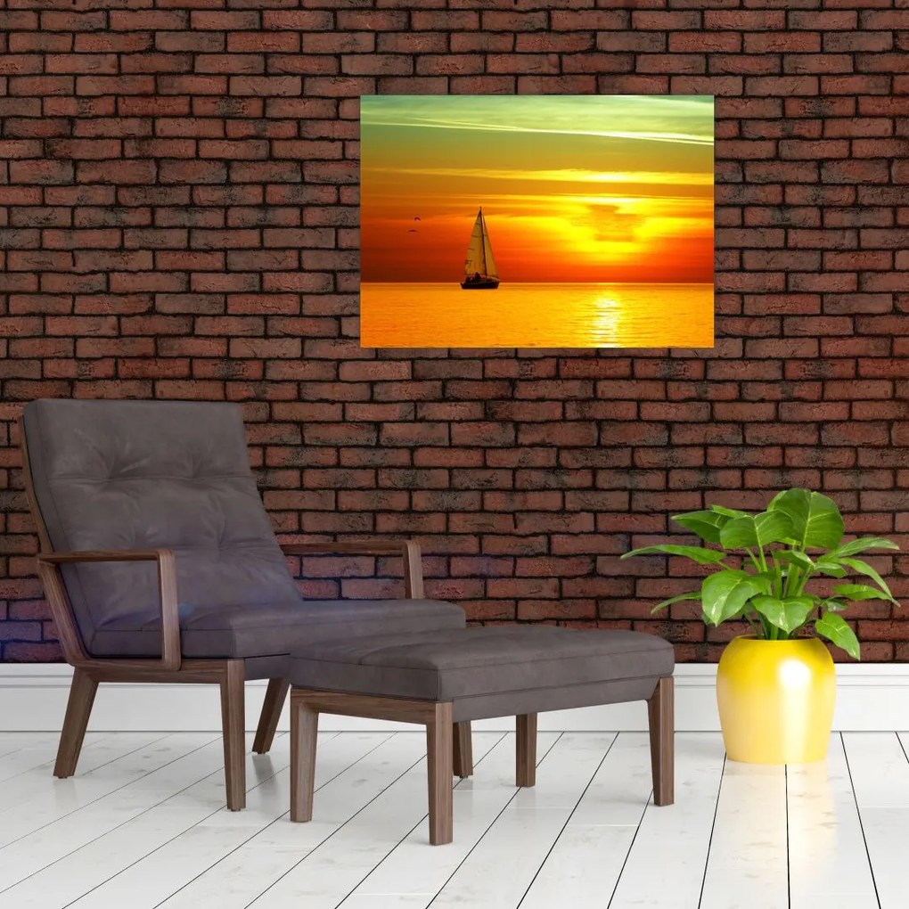 Obraz na szkle - zachód słońca z jachtem (70x50 cm)