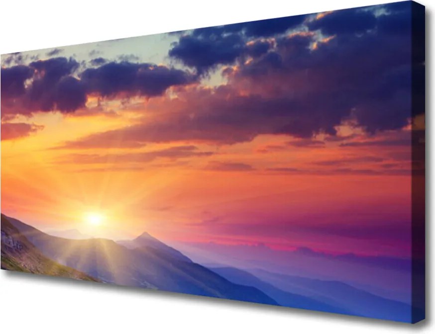 Obraz canvas Promienie Słońca nad Szczytami