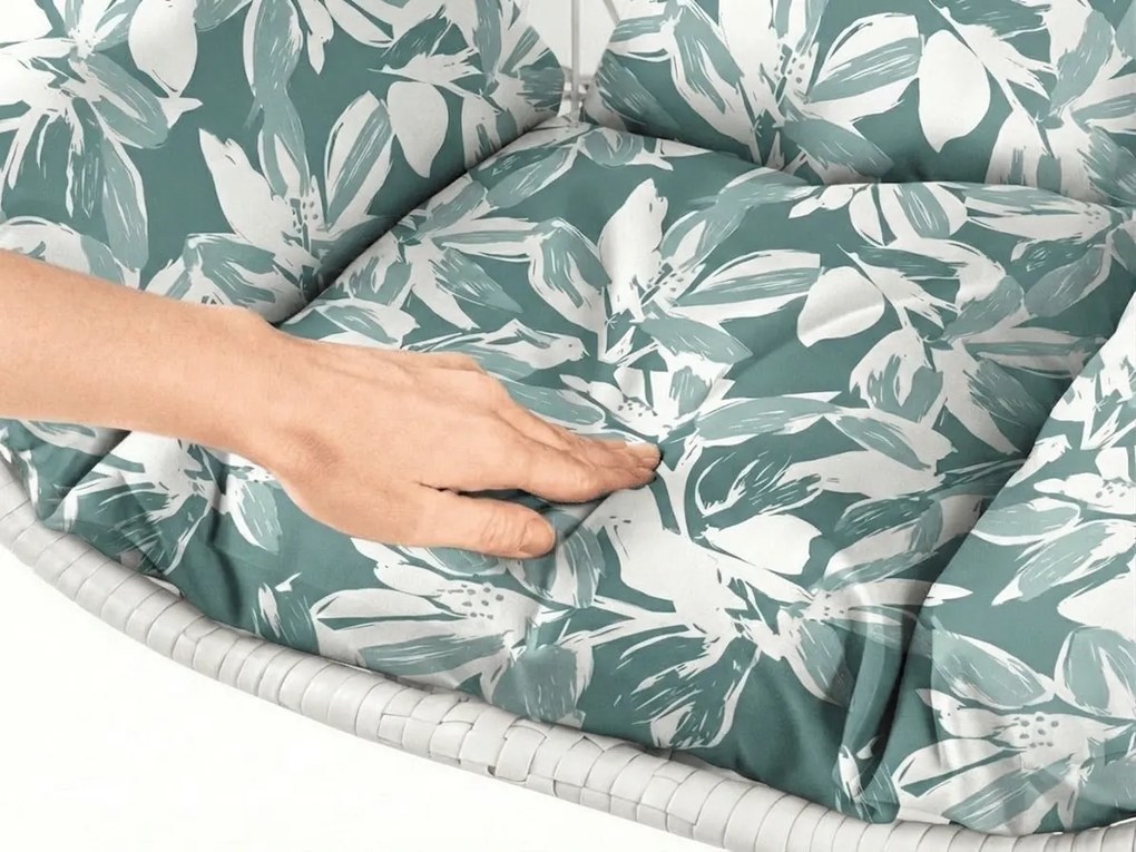 Białe wiszące krzesło KOKON ze stelażem, zielono-biała poduszka