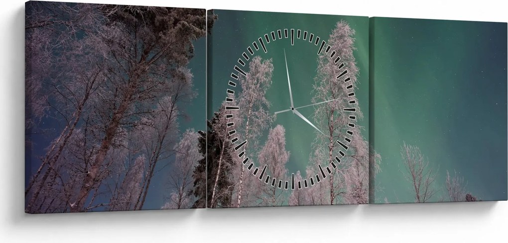 Obraz zorzy polarnej nad zamarzniętymi drzewami (z zegarem) (90x30 cm)