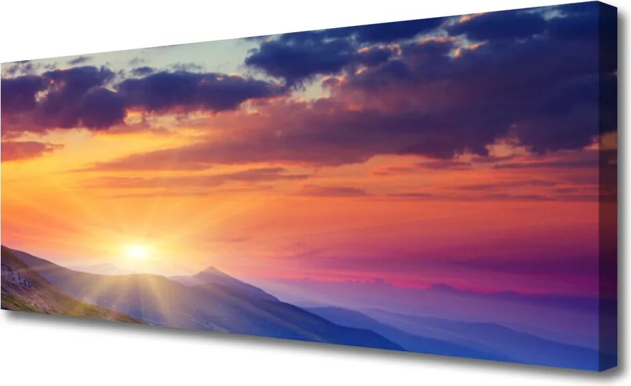 Obraz canvas Promienie Słońca nad Szczytami
