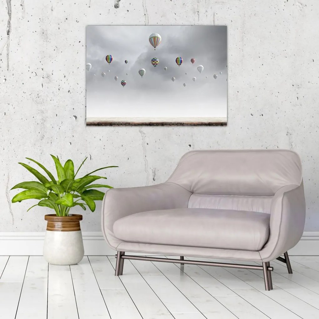 Obraz - Balony nad ceglaną ścianą (70x50 cm)