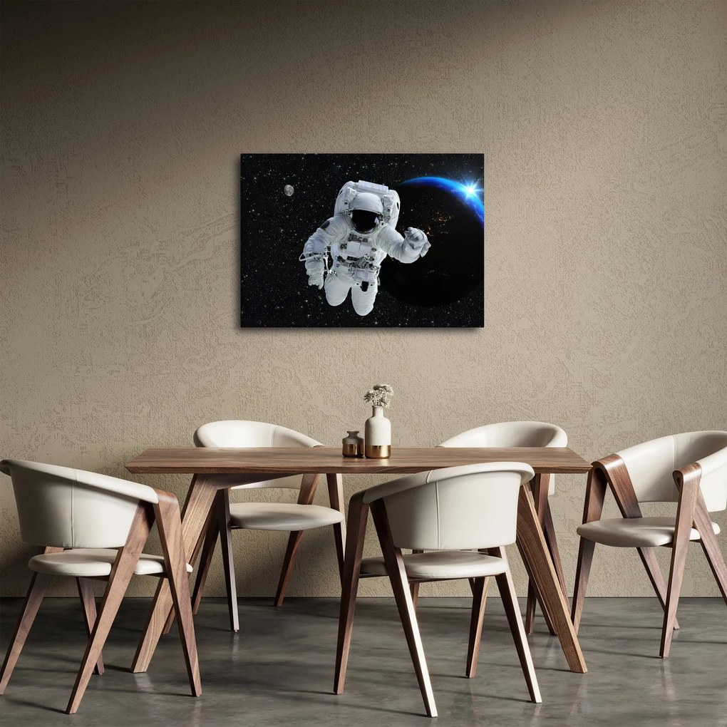 Obraz - Astronauta w kosmosie (70x50 cm)