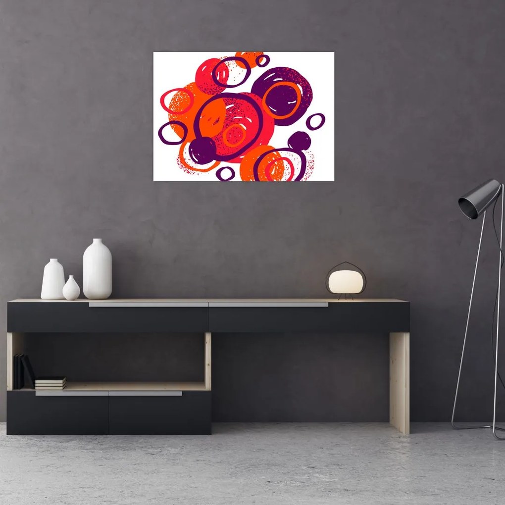 Obraz na szkle - Motyw z kółkami w ciepłych kolorach (70x50 cm)