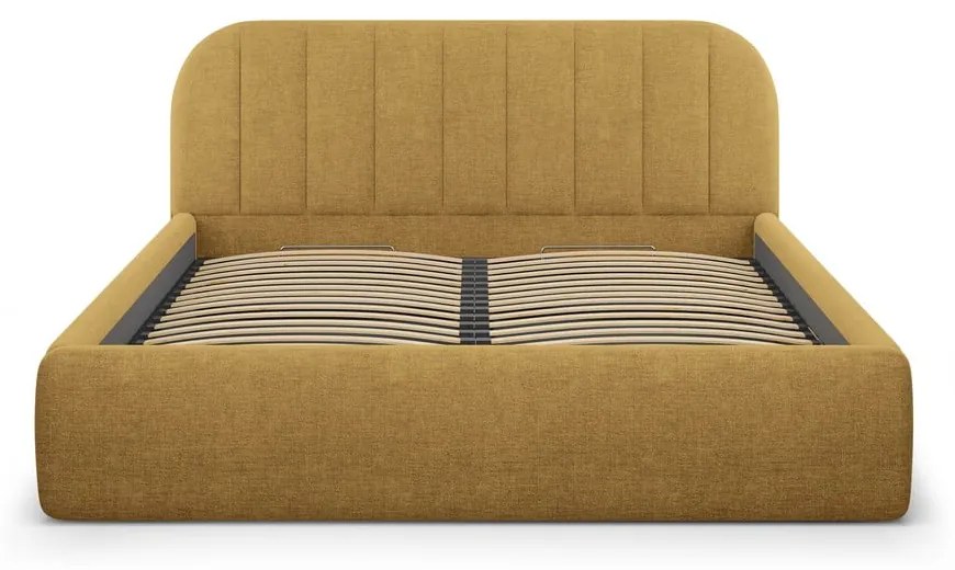 Musztardowe tapicerowane łóżko dwuosobowe ze schowkiem ze stelażem 200x200 cm Juno – Windsor &amp; Co Sofas