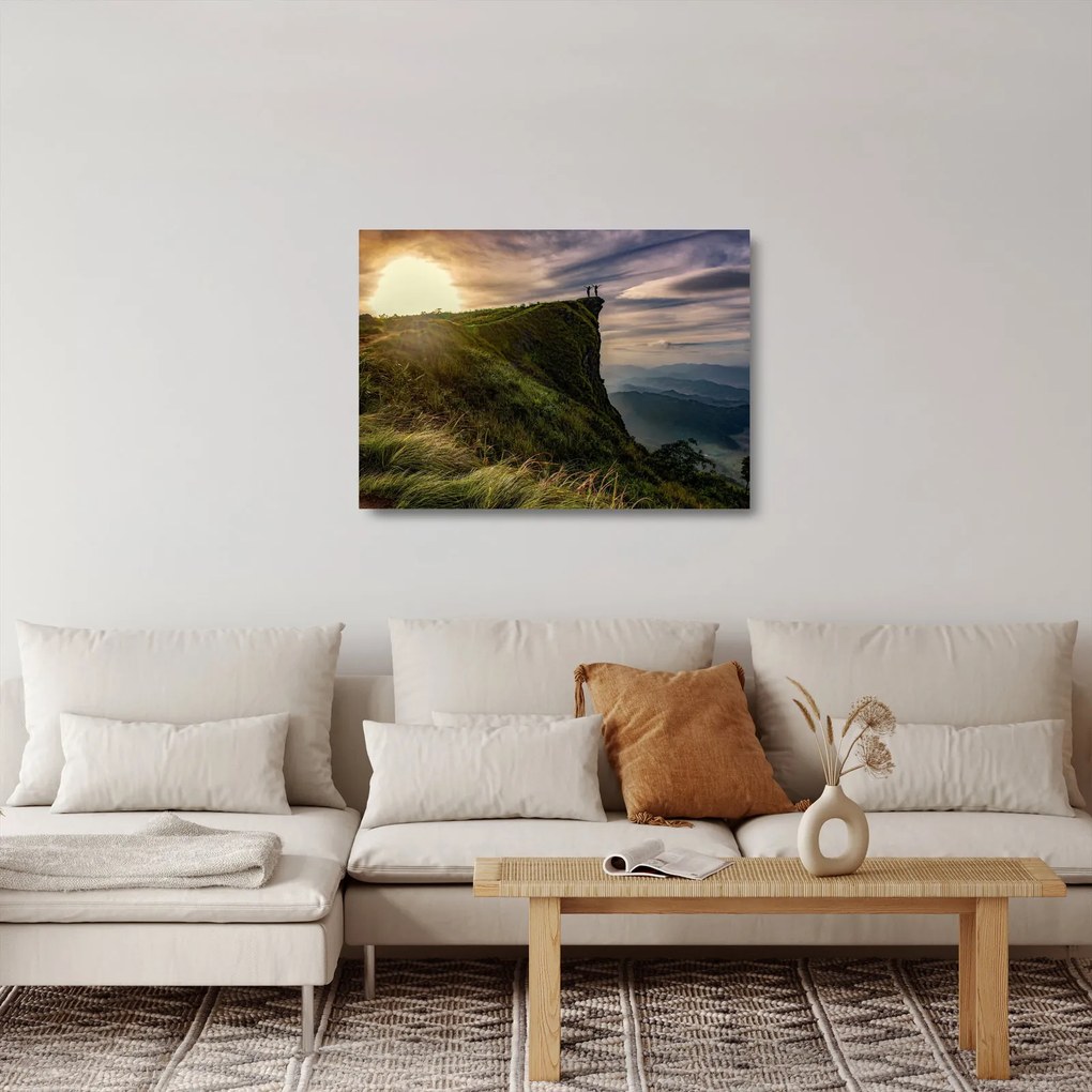 Obraz na szkle kobiet na klifie (70x50 cm)