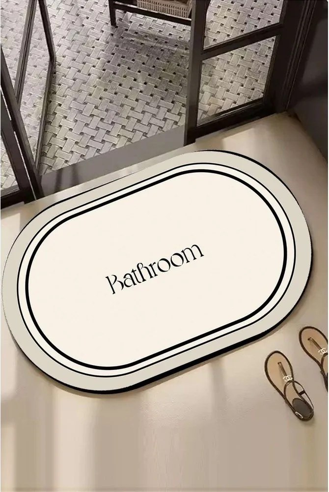 Kremowy dywanik łazienkowy 60x100 cm Farbelle – Foutastic