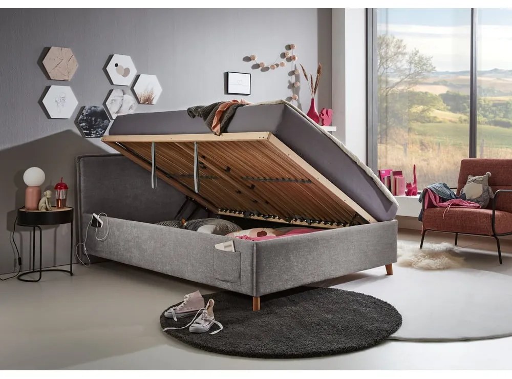 Szare tapicerowane łóżko dziecięce ze schowkiem ze stelażem 140x200 cm Fun – Meise Möbel