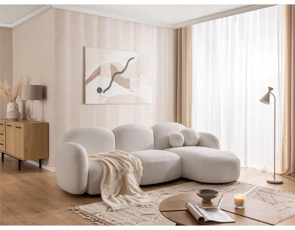 Kremowy narożnik z materiału bouclé (prawostronny/z szezlongiem) Orbit – Ropez